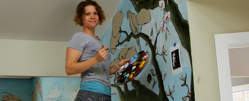 Mary Thiefels painting the HIdden Worlds Private Space Mural